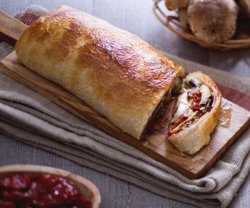 Rolo de cogumelos porcini e presunto