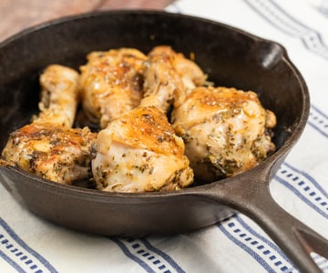 Coxas de frango na frigideira