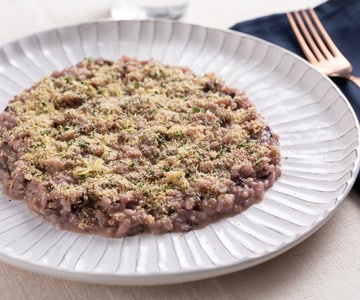 Risoto com radicchio, manteiga de anchovas e pão aromático