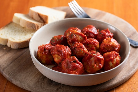 Bolinhos de bacalhau ao molho