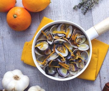 Sautê de mariscos à laranja