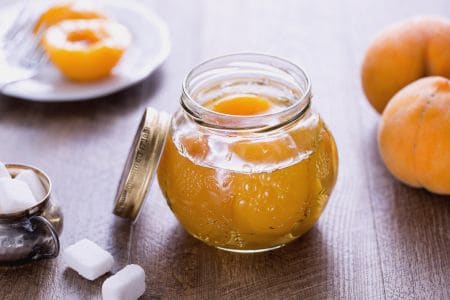 Pêssegos em calda