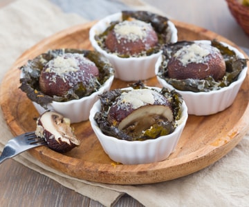 Cestinhas de folhas de videira com porcini e Grana Padano