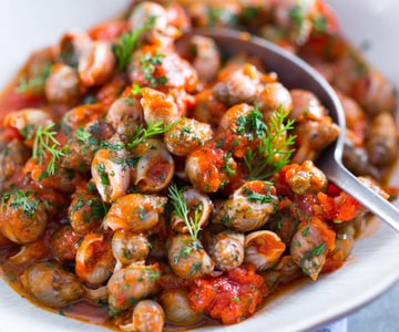 Caracóis do mar ensopados