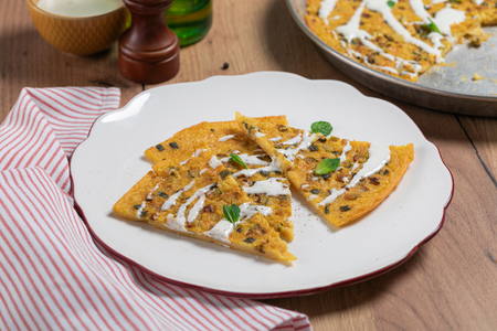 Farinata com abobrinha e fonduta de pecorino