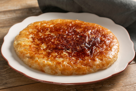 Frico com batatas e cebolas