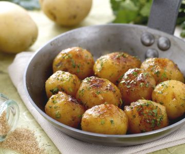 Batatas novas caramelizadas